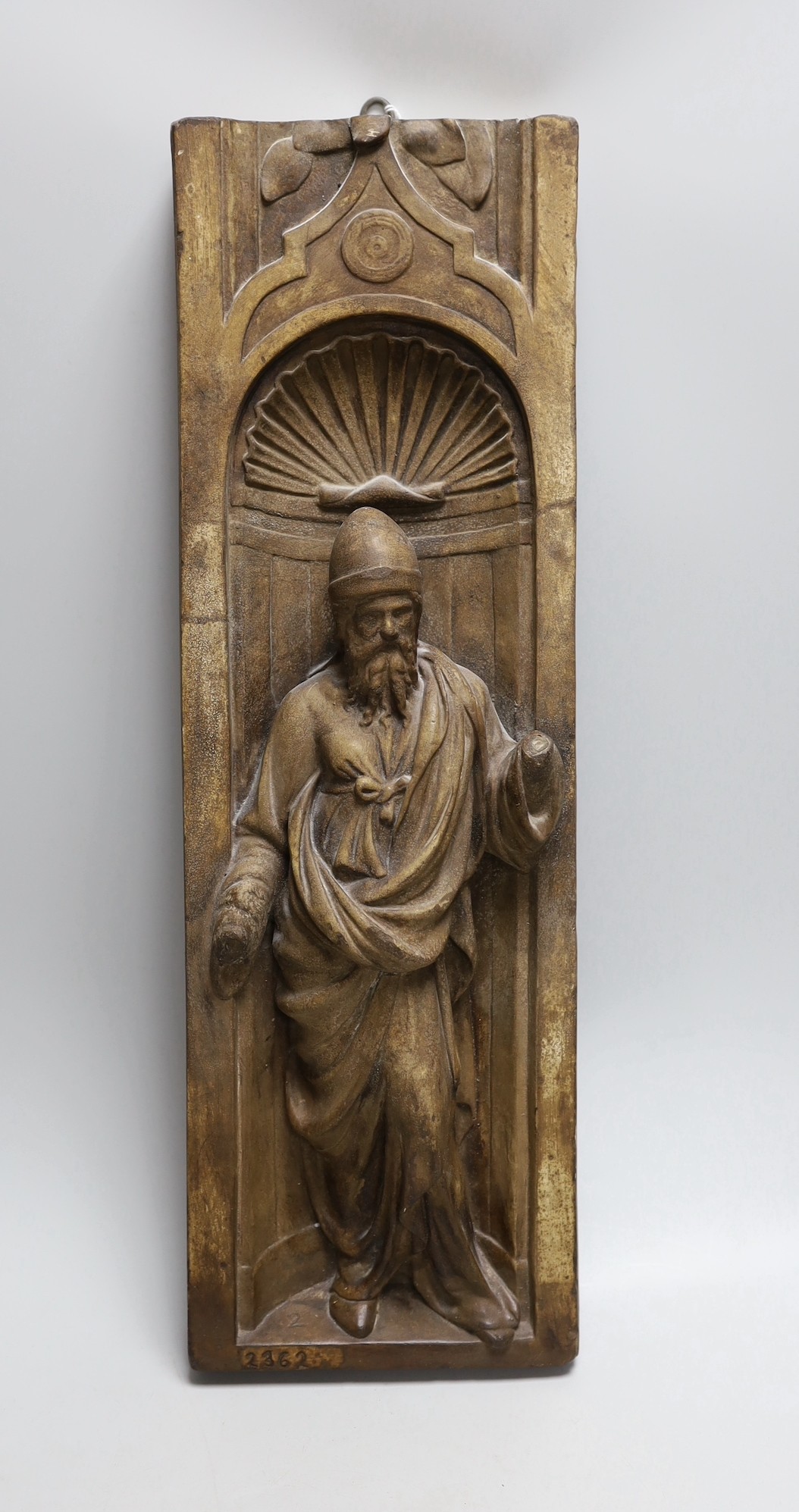 A religious cast plaster figure in niche, numbered 2362. 53cm tall